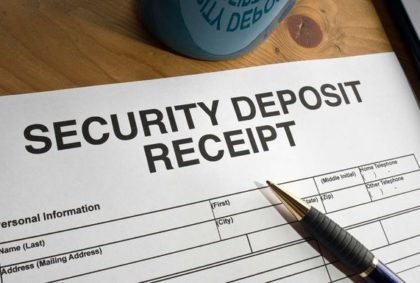Security Deposit Receipt form and a pen